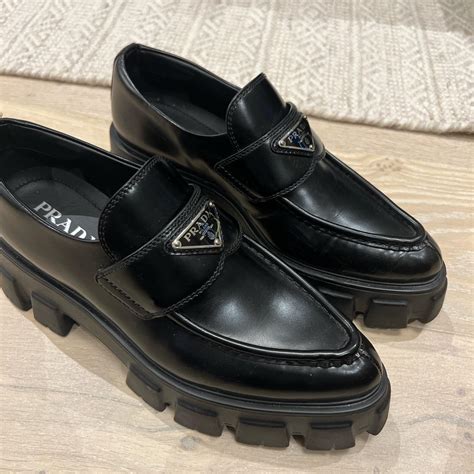 used prada loafers.